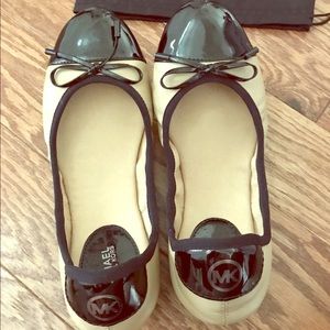 Beautiful Black and Tan MK City ballet shoes.